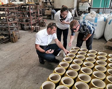 Mr Alex from Hawle Germany come to visit us, he is checking our Resin sand process.